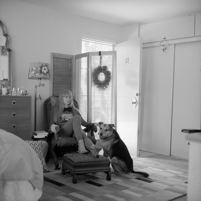 Shannon Rose Riley and Joey Ramone the dog of San Jose, Calif., are among the subjects of more than 600 portraits by the photographer Tanya Hollander, who set out to meet and photograph all of her Facebook friends. The work will be exhibited at Mass MoCA beginning in March 2017. courtesy of Tanya Hollander 