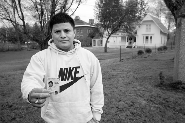 Emerson Exante, a legal immigrant from Guatemala who works at a Washington County dairy farm, shows off his new New York driver’s license. But for the many undocumented workers at farms and elsewhere in the region, getting a license isn’t an option. Legislative proposals to change that have lately been drawing support -- and strong opposition. Joan K. Lentini photo