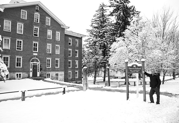 Head of School Andrew Vadnais stands outside the administration and classroom building at Darrow School in late January after the school’s leaders reversed a decision to shut down at the end of the current academic year. Susan Sabino photo