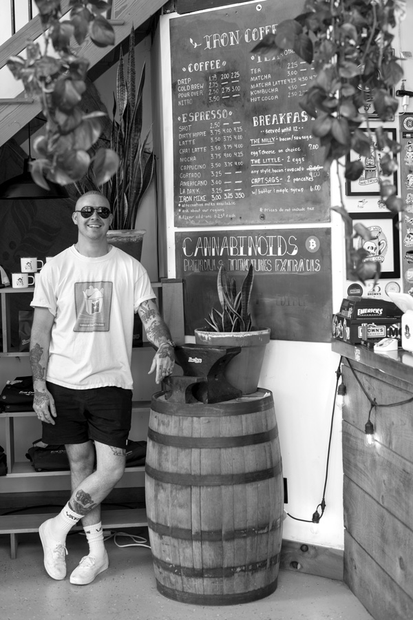 Mike Milliron, right, started roasting coffee beans six years ago at his Iron Coffee Co. at the corner of Main and John streets. Joan K. Lentini photo