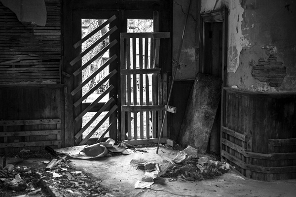 Supporters of the effort to save the old station say the debris-filled interior could one day be restored to its original appearance. But the first priorities are to pay the back taxes and stabilize the structure. Joan K. Lentini photo