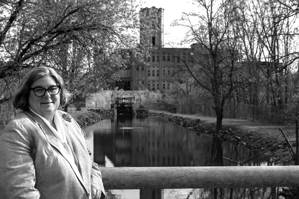 Assemblywoman Carrie Woerner stands outside a long-vacant mill complex in the village of Victory, N.Y. It’s the kind of structure she says could be redeveloped to ease the state’s housing shortage -- with help from an expanded tax credit for large historic buildings.Joan K. Lentini photo Assemblywoman Carrie Woerner stands outside a long-vacant mill complex in the village of Victory, N.Y. It’s the kind of structure she says could be redeveloped to ease the state’s housing shortage -- with help from an expanded tax credit for large historic buildings.Joan K. Lentini photo