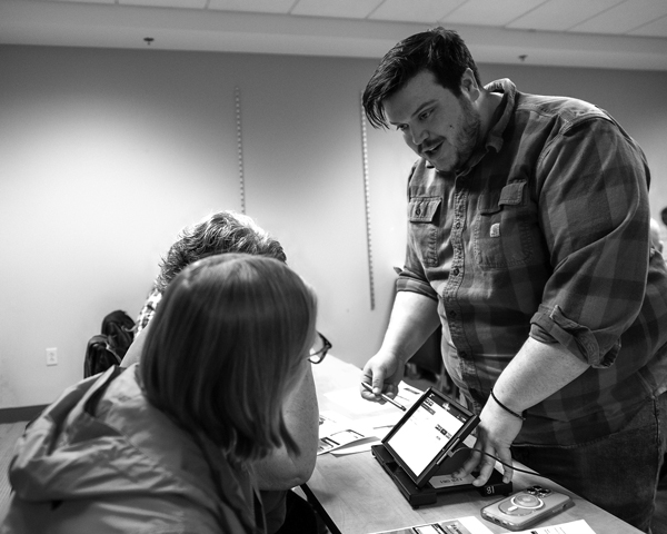 

Harold Hubbard, the Republican deputy elections commissioner of Warren County, instructs elections inspectors at a recent training session on the use of electronic poll books. The devices ensure that voters who cast ballots at New York’s early voting sites cannot vote more than once. Photo by Joan K. Lentini